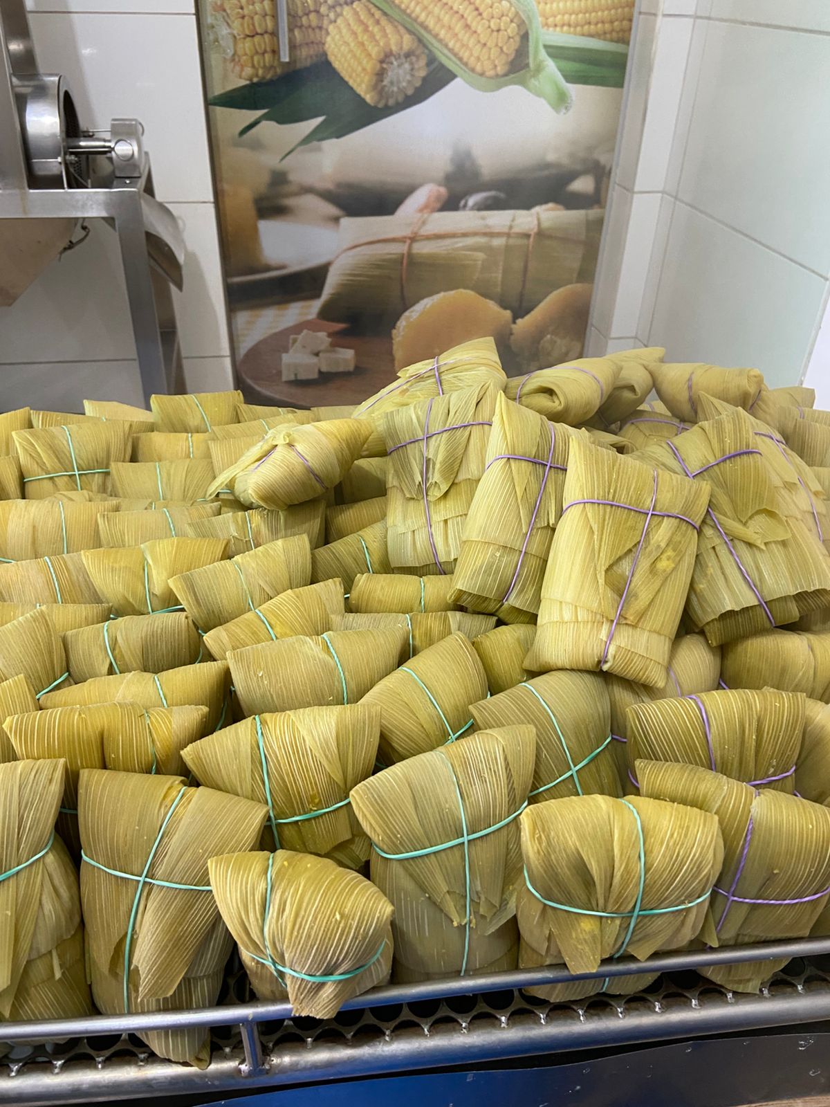 Pamonhas prontas, embrulhadas na palha