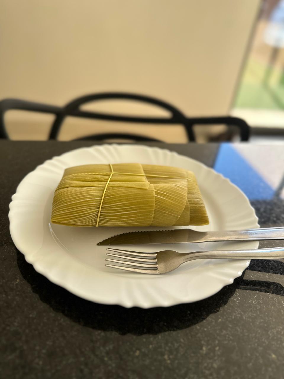 Pamonha embrulhada na palha